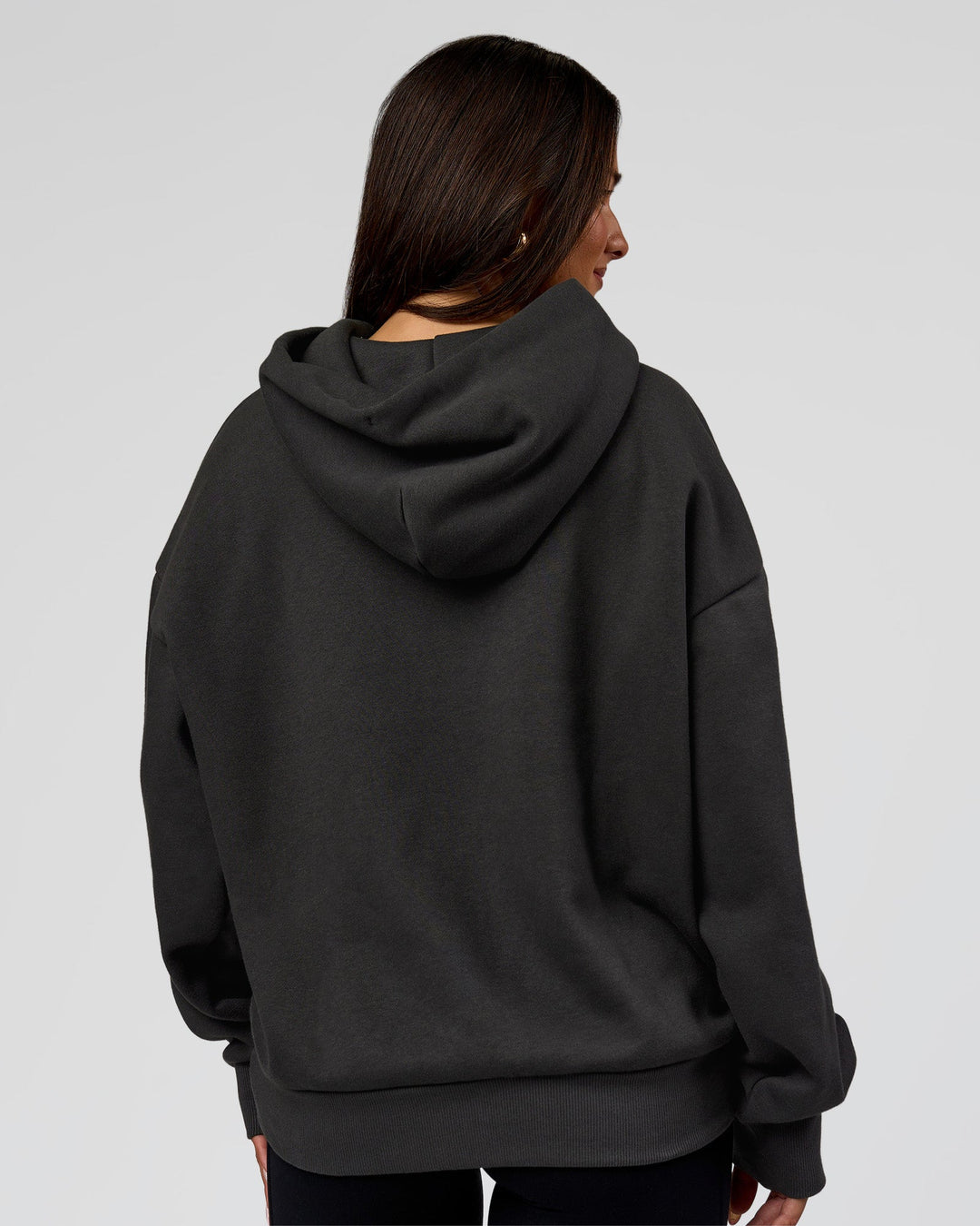 Woman wearing Base Oversized DC Hoodie - Onyx | Model:Bianca | Size:XS - view 8