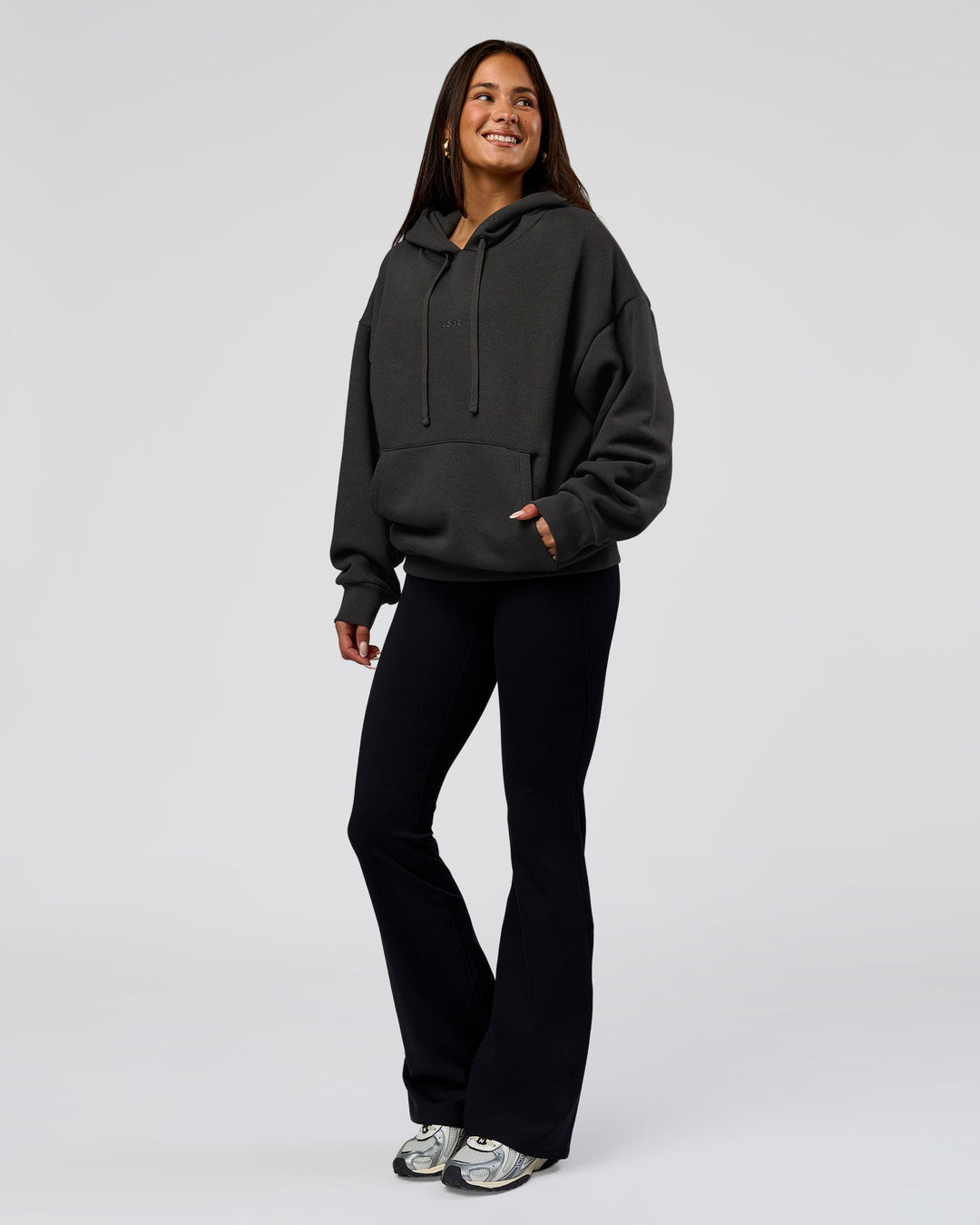 Woman wearing Base Oversized DC Hoodie - Onyx | Model:Bianca | Size:XS - view 10