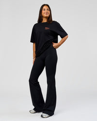 Woman wearing Coffee Run FLXCotton Oversized Tee - Black-Ultra Orange | Model:Bianca | Size:XS | Thumbnail Index: 9