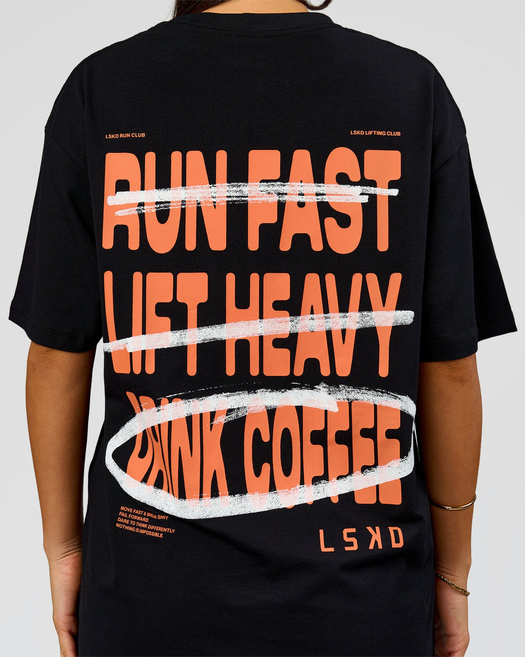 Woman wearing Coffee Run FLXCotton Oversized Tee - Black-Ultra Orange | Model:Bianca | Size:XS - view 11