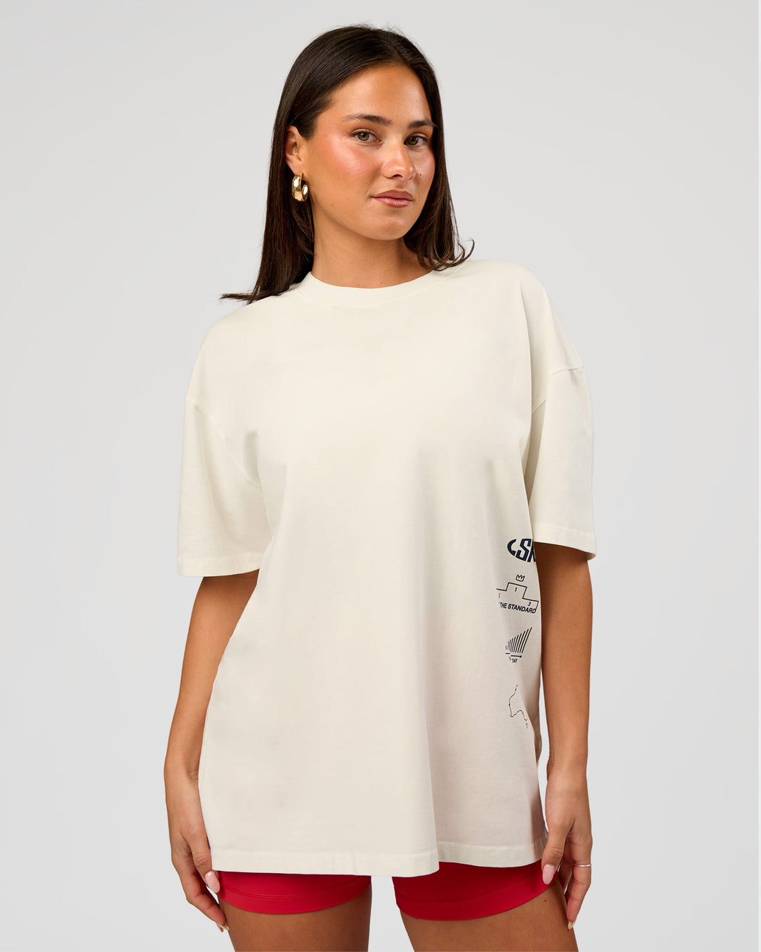 Woman wearing Greatest of All Time Heavyweight FLXCotton Oversized Tee - Off White Washed-Scarlet | Model:Bianca | Size:XS - view 10