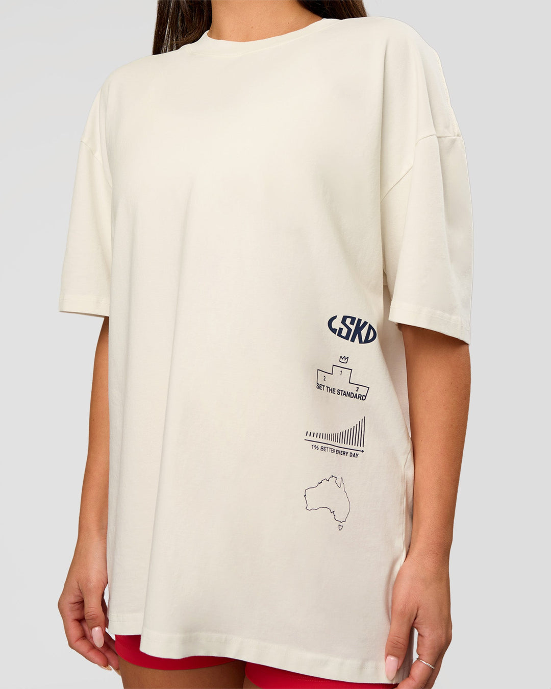 Woman wearing Greatest of All Time Heavyweight FLXCotton Oversized Tee - Off White Washed-Scarlet | Model:Bianca | Size:XS - view 11