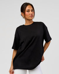 Woman wearing Tonal Legacy Heavyweight Oversized Tee - Black-Black | Model:Bianca | Size:XS | Thumbnail Index: 5