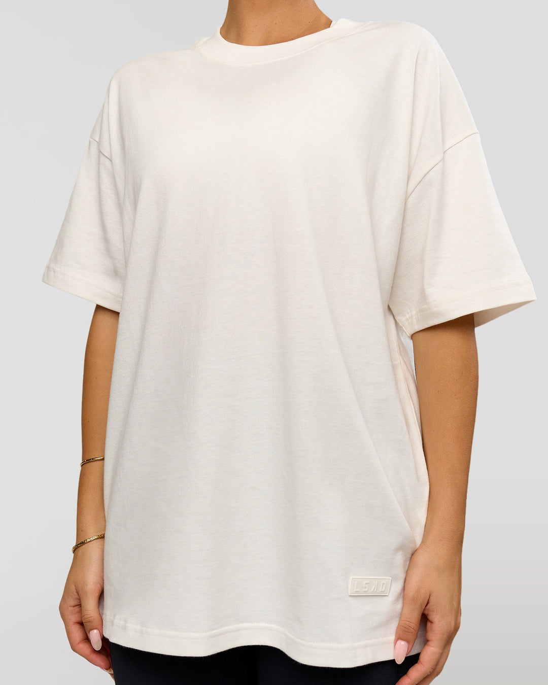 Woman wearing Tonal Legacy Heavyweight Oversized Tee - Off White-Off White | Model:Bianca | Size:XS - view 11