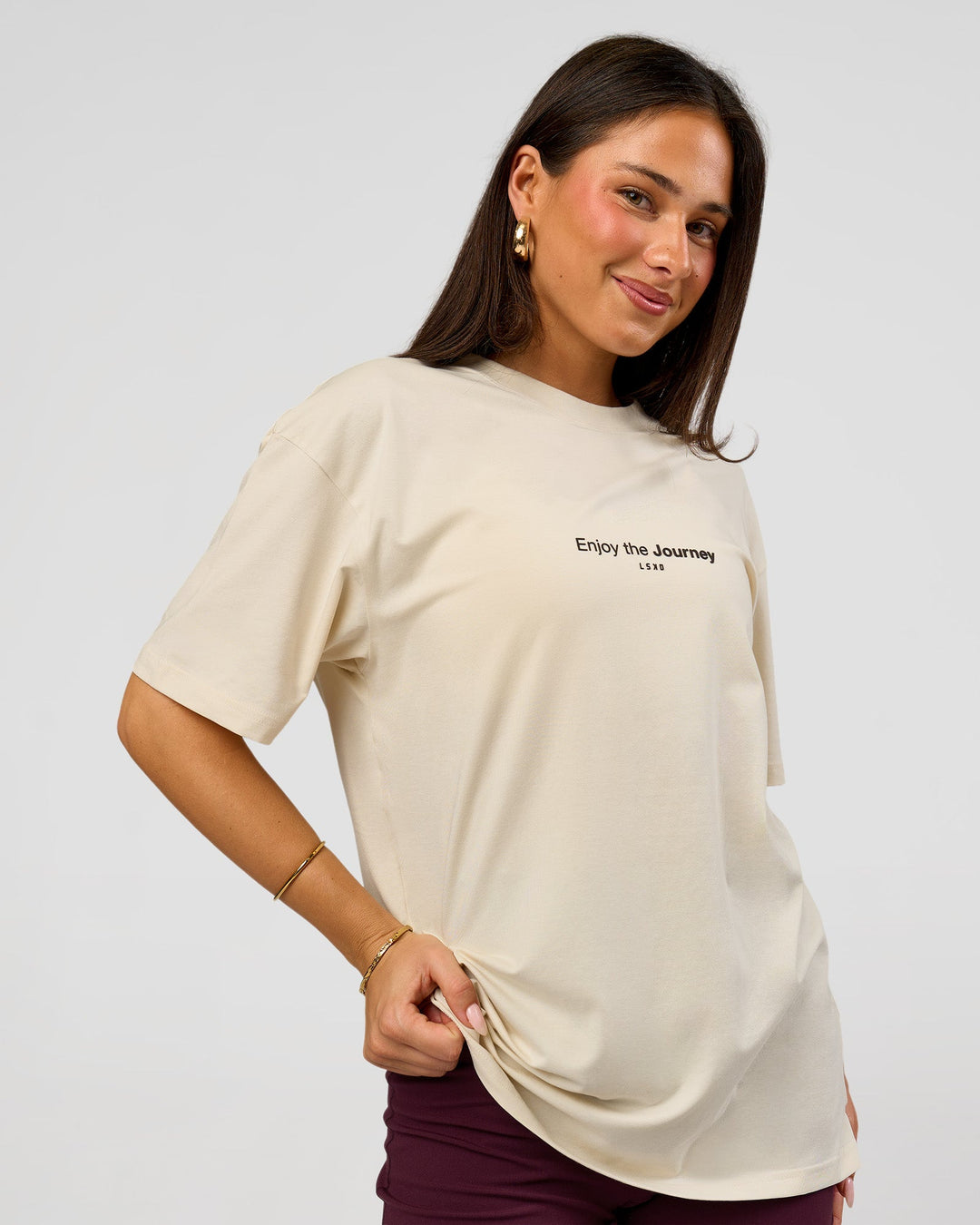 Woman wearing VS1 Enjoy The Journey FLXCotton Oversize Tee - Vanilla Bean | Model:Bianca | Size:XS - view 3