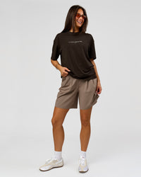 Woman wearing VS6 1% Better FLXCotton Oversize Tee - Ground Coffee | Model:Bianca | Size:XS | Thumbnail Index: 9