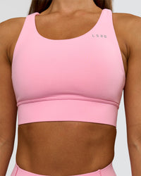 Woman wearing Accelerate Sports Bra - Pink Rose | Model:Brylee | Size:XS | Thumbnail Index: 2