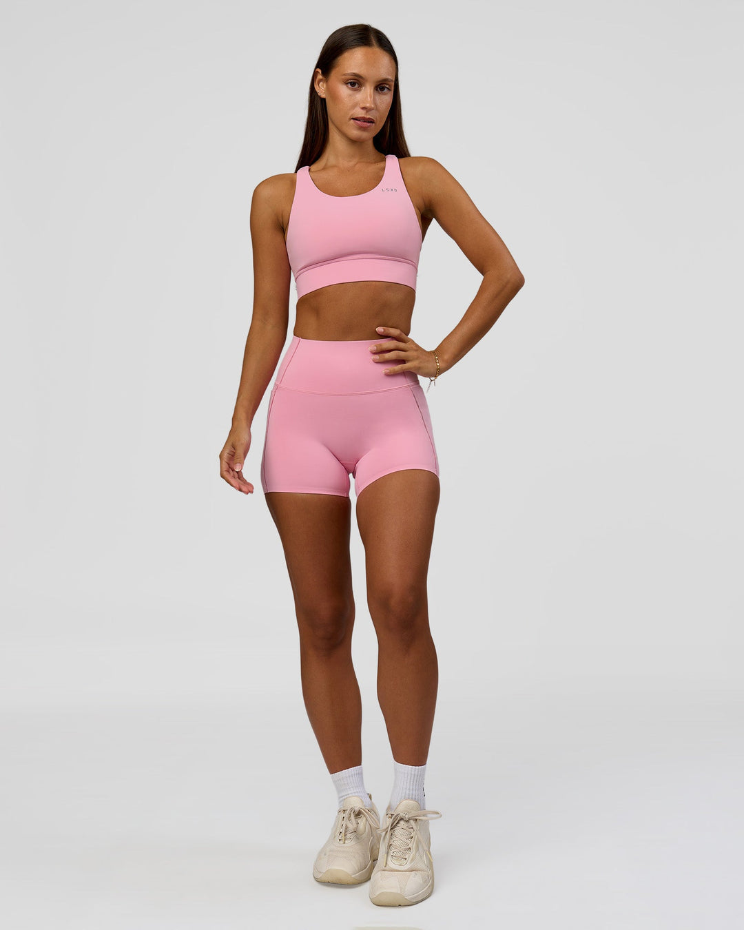 Woman wearing Accelerate Sports Bra - Pink Rose | Model:Brylee | Size:XS - view 9