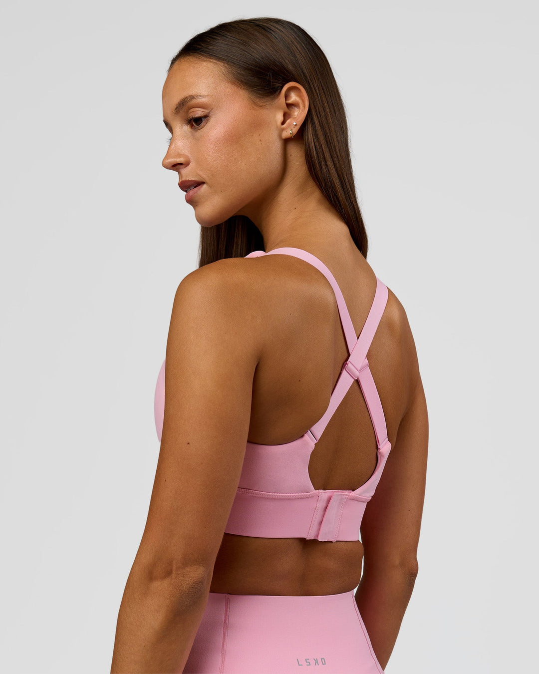Woman wearing Accelerate Sports Bra - Pink Rose | Model:Brylee | Size:XS - view 11
