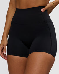 Woman wearing Fusion Bonded High-Rise 4" Short Pockets - Black | Model:Brylee | Size:XS | Thumbnail Index: 0