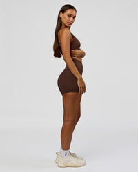 Woman wearing Fusion Bonded High-Rise 4" Short Pockets - Hot Chocolate | Model:Brylee | Size:XS | Thumbnail Index: 7