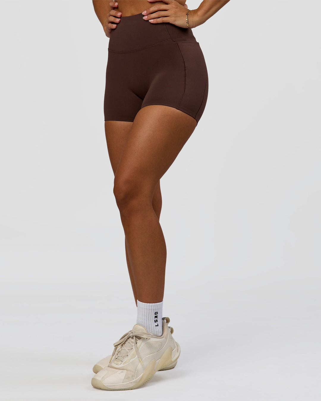 Woman wearing Fusion Bonded High-Rise 4" Short Pockets - Hot Chocolate | Model:Brylee | Size:XS - view 9