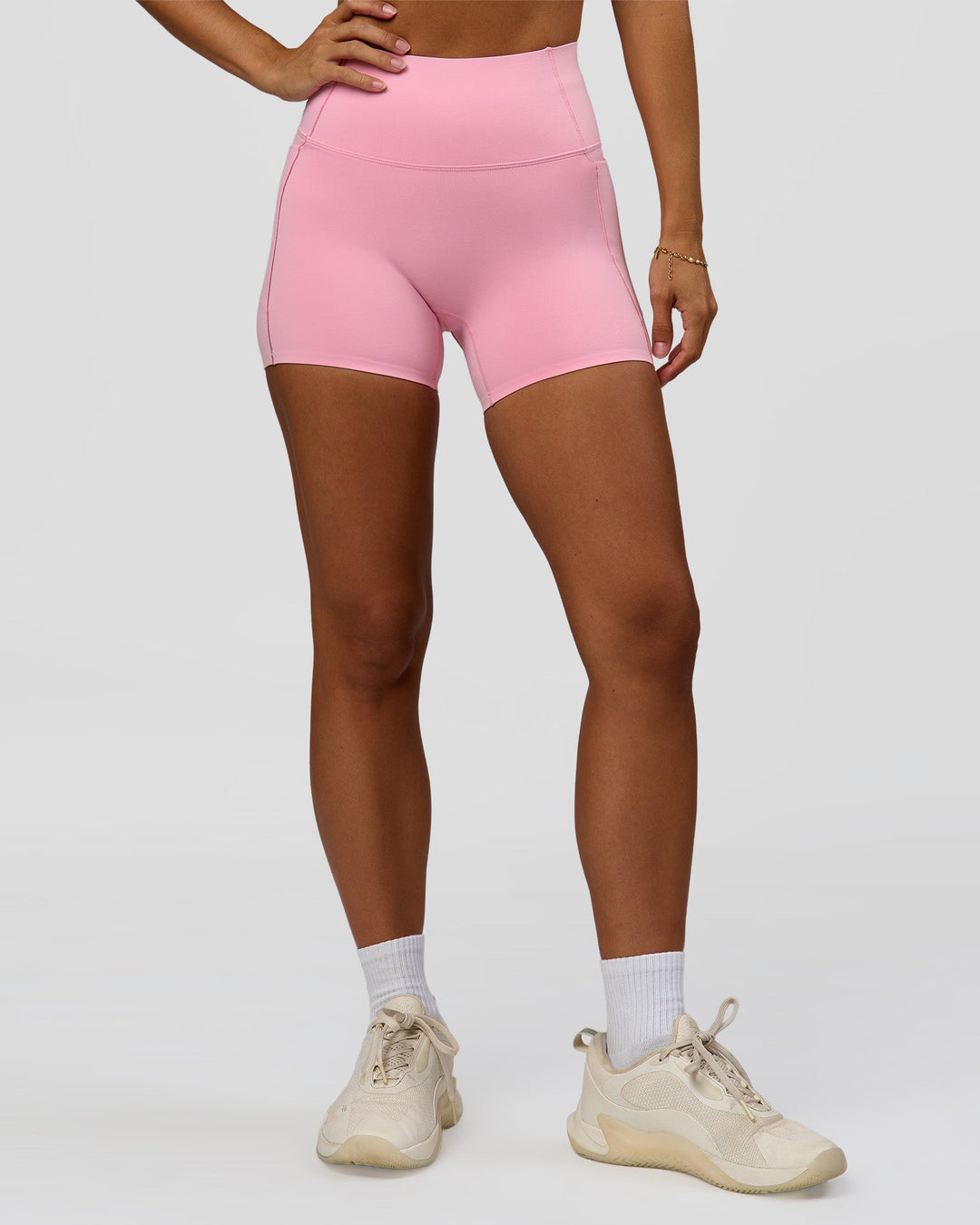Woman wearing Fusion Bonded High-Rise 4" Short Pockets - Pink Rose | Model:Brylee | Size:XS - view 3