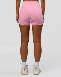 Woman wearing Fusion Bonded High-Rise 4" Short Pockets - Pink Rose | Model:Brylee | Size:XS | Thumbnail Index: 7