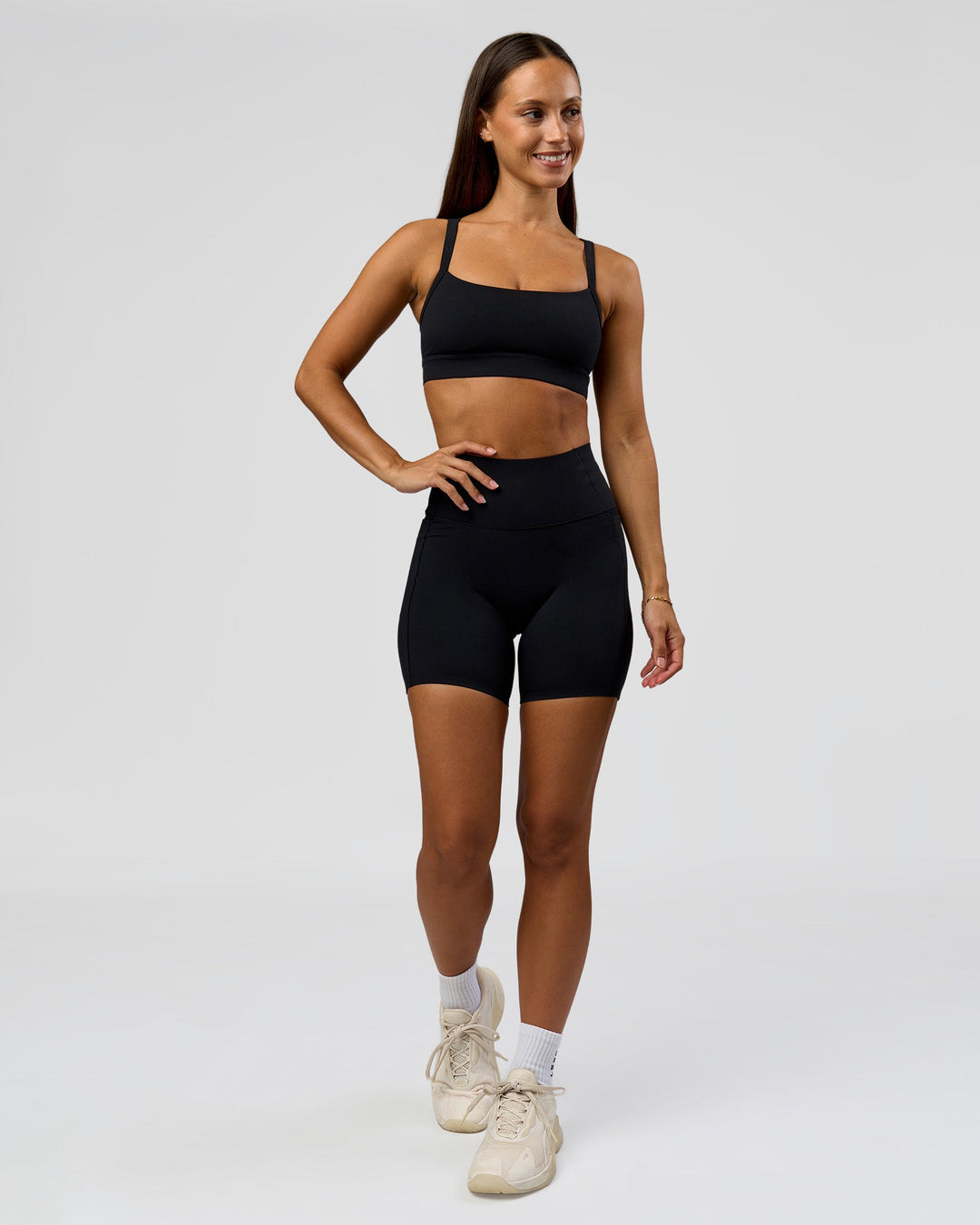 Woman wearing Fusion Bonded High-Rise 6" Short Pockets - Black | Model:Brylee | Size:XS - view 4