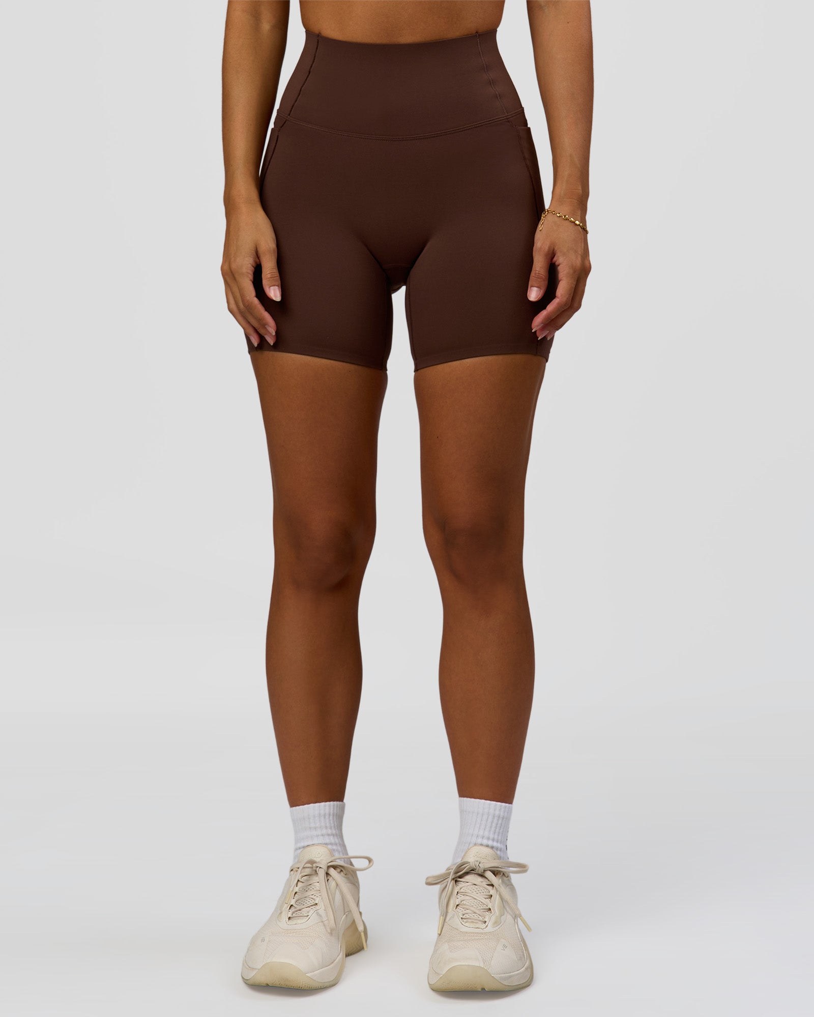 Woman wearing Fusion Bonded High-Rise 6" Short Pockets - Hot Chocolate | Model:Brylee | Size:XS