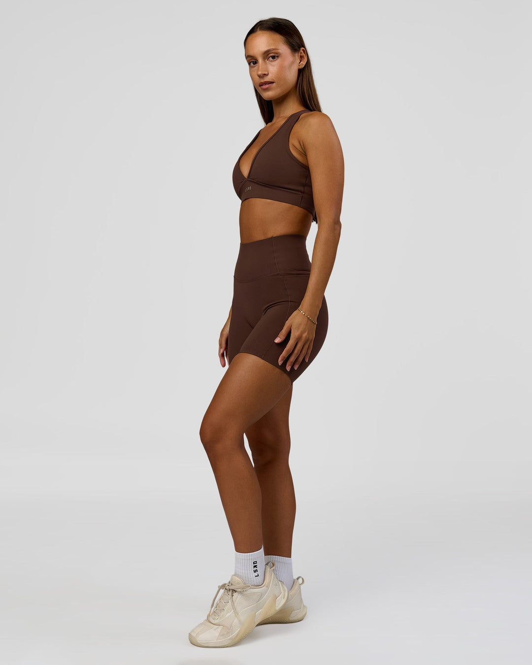 Woman wearing Fusion Bonded High-Rise 6" Short Pockets - Hot Chocolate | Model:Brylee | Size:XS - view 3