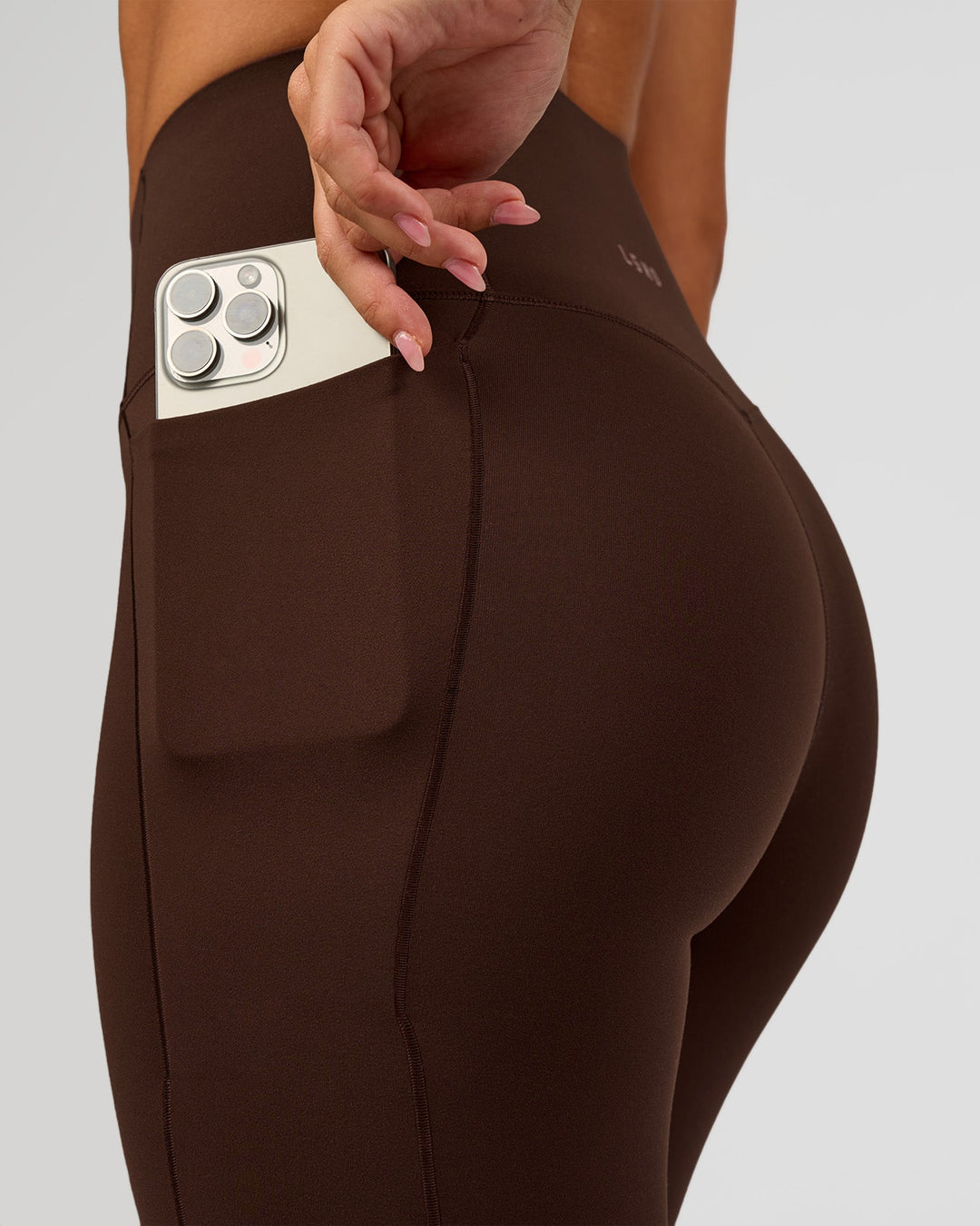 Woman wearing Fusion Bonded High-Rise Full Length Legging Pockets - Hot Chocolate | Model:Brylee | Size:XS - view 5