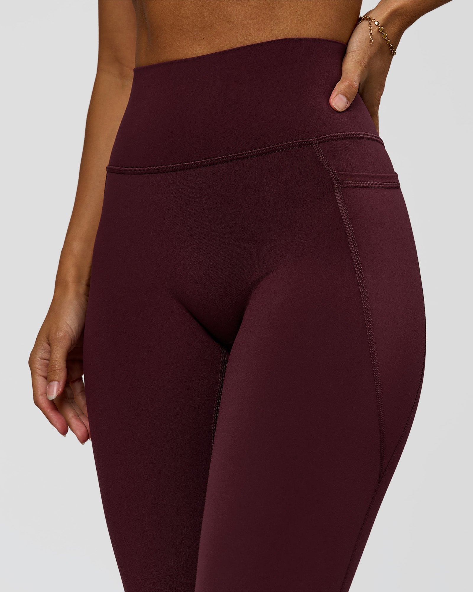 Woman wearing Fusion Ultra High-Rise Full Length Legging Pockets - Cherry Lacquer | Model:Brylee | Size:XS
