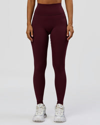 Woman wearing Fusion Ultra High-Rise Full Length Legging Pockets - Cherry Lacquer | Model:Brylee | Size:XS | Thumbnail Index: 3