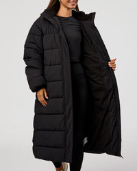 Woman wearing Go-To Puffer Long Jacket - Black | Model:Brylee | Size:XS | Thumbnail Index: 9