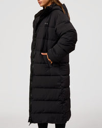 Woman wearing Go-To Puffer Long Jacket - Black | Model:Brylee | Size:XS | Thumbnail Index: 4