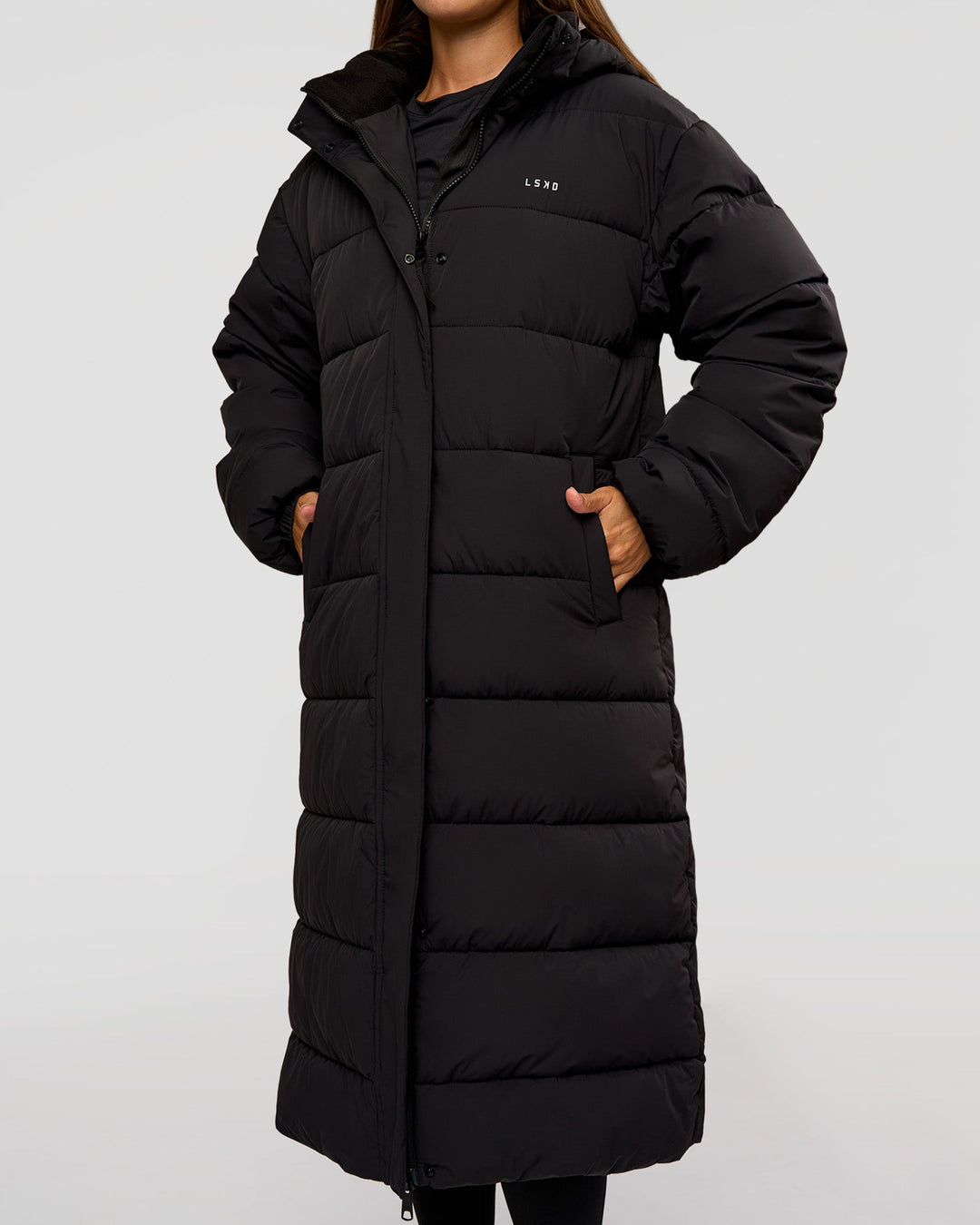 Woman wearing Go-To Puffer Long Jacket - Black | Model:Brylee | Size:XS - view 9