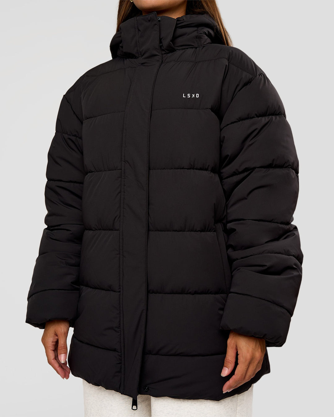 Woman wearing Go-To Puffer Mid Jacket - Black | Model:Brylee | Size:XS - view 9