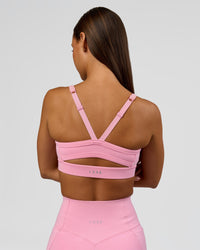 Woman wearing Momentum Sports Bra - Pink Rose | Model:Brylee | Size:XS | Thumbnail Index: 1