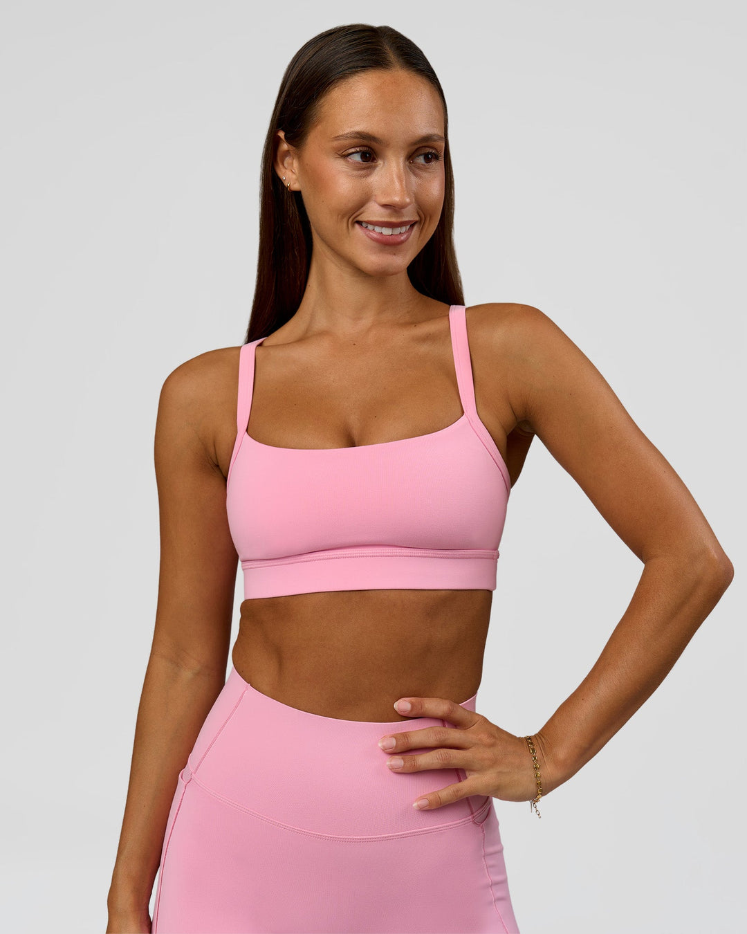 Woman wearing Momentum Sports Bra - Pink Rose | Model:Brylee | Size:XS - view 3