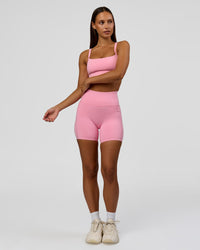 Woman wearing Momentum Sports Bra - Pink Rose | Model:Brylee | Size:XS | Thumbnail Index: 4