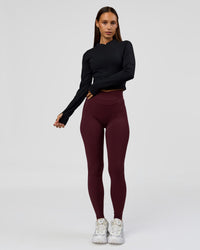 Woman wearing Sculpt Full Zip Long Sleeve Top - Black | Model:Brylee | Size:XS | Thumbnail Index: 5