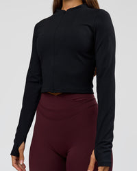 Woman wearing Sculpt Full Zip Long Sleeve Top - Black | Model:Brylee | Size:XS | Thumbnail Index: 6