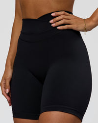 Woman wearing Solstice High-Rise 6" Short - Black | Model:Brylee | Size:XS | Thumbnail Index: 0