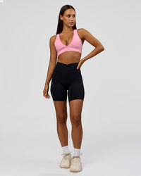 Woman wearing Solstice High-Rise 6" Short - Black | Model:Brylee | Size:XS | Thumbnail Index: 2