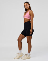 Woman wearing Solstice High-Rise 6" Short - Black | Model:Brylee | Size:XS | Thumbnail Index: 3
