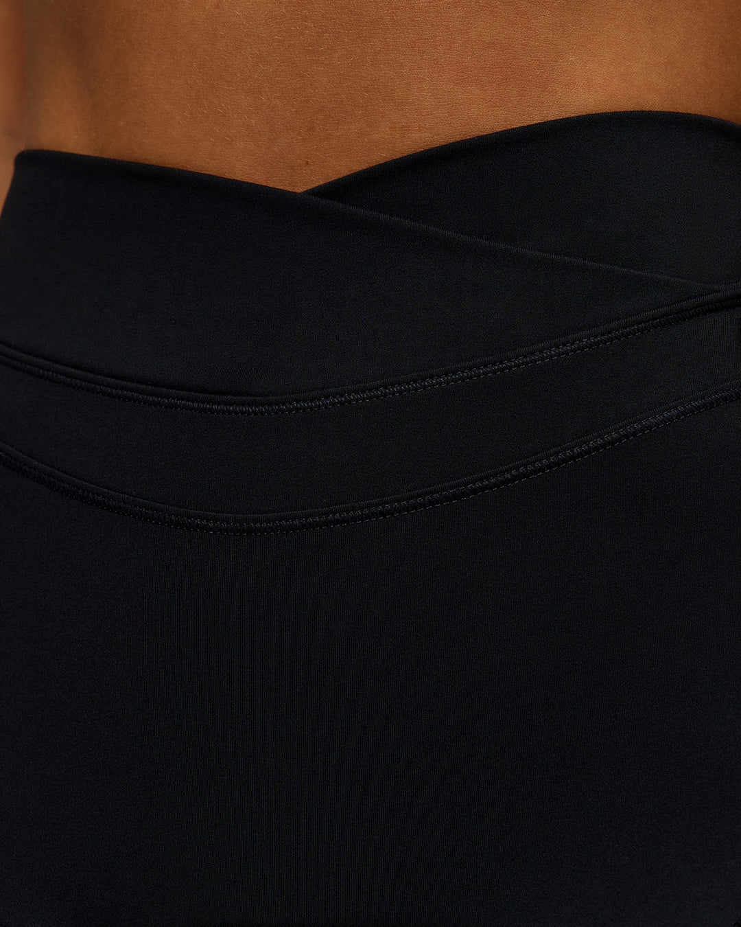 Woman wearing Solstice High-Rise 6" Short - Black | Model:Brylee | Size:XS - view 6