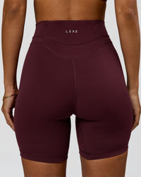 Woman wearing Solstice High-Rise 6" Short - Cherry Lacquer | Model:Brylee | Size:XS | Thumbnail Index: 3