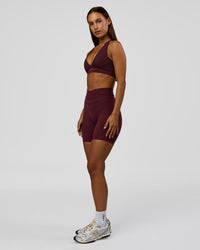 Woman wearing Solstice High-Rise 6" Short - Cherry Lacquer | Model:Brylee | Size:XS | Thumbnail Index: 5