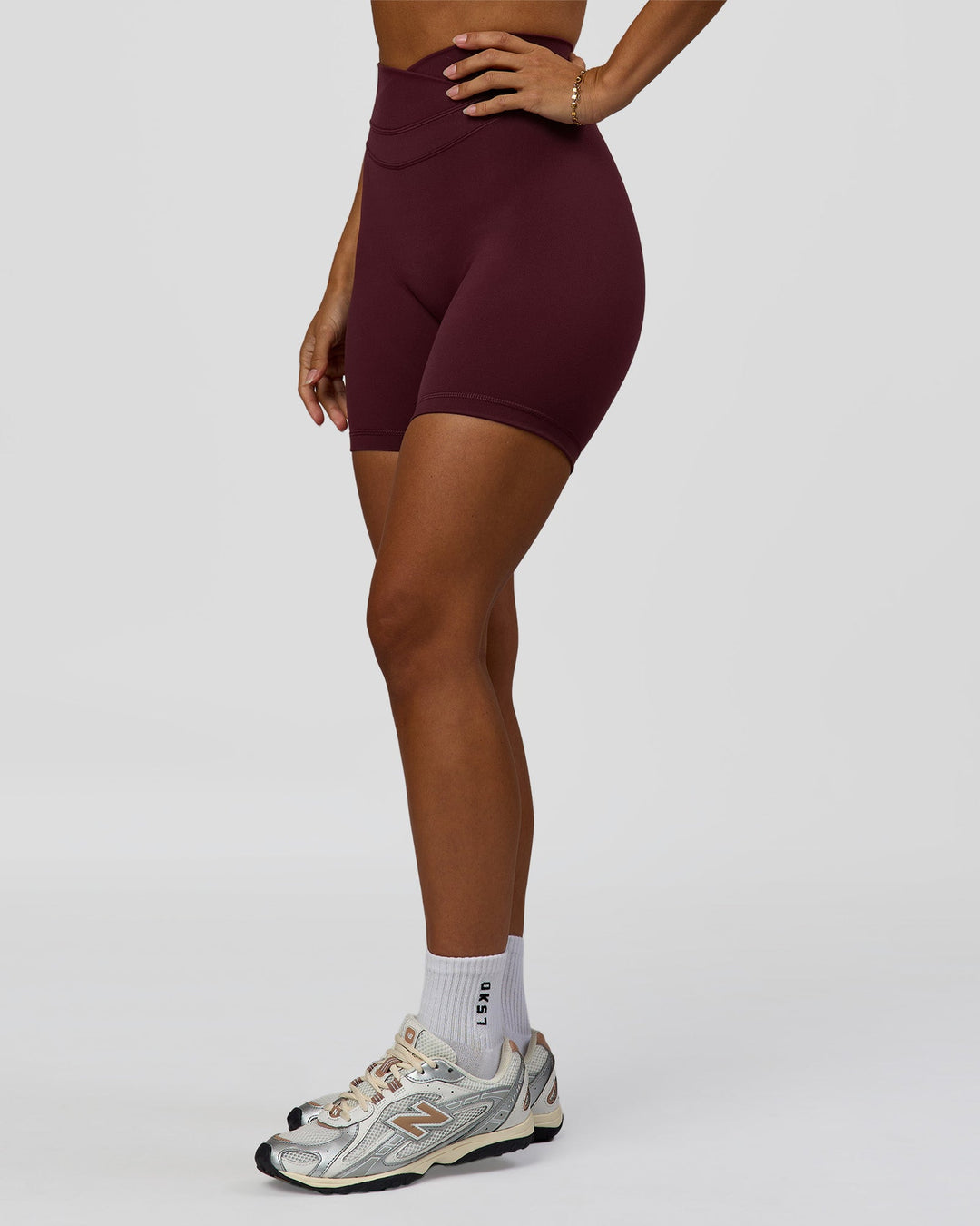 Woman wearing Solstice High-Rise 6" Short - Cherry Lacquer | Model:Brylee | Size:XS - view 7