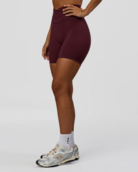 Woman wearing Solstice High-Rise 6" Short - Cherry Lacquer | Model:Brylee | Size:XS | Thumbnail Index: 6
