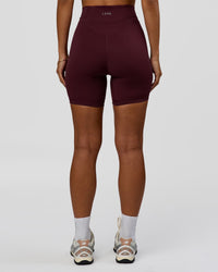 Woman wearing Solstice High-Rise 6" Short - Cherry Lacquer | Model:Brylee | Size:XS | Thumbnail Index: 8