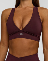 Woman wearing Stamina Sports Bra - Cherry Lacquer | Model:Brylee | Size:XS | Thumbnail Index: 2