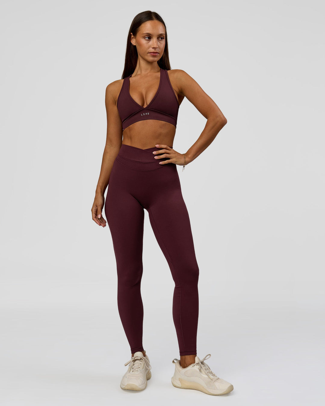 Woman wearing Stamina Sports Bra - Cherry Lacquer | Model:Brylee | Size:XS - view 4