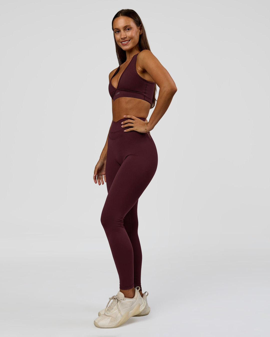 Woman wearing Stamina Sports Bra - Cherry Lacquer | Model:Brylee | Size:XS - view 8