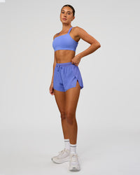 Woman wearing Accelerate 3" High-Rise Running Short - Bluebell | Model:Charli | Size:XS | Thumbnail Index: 1