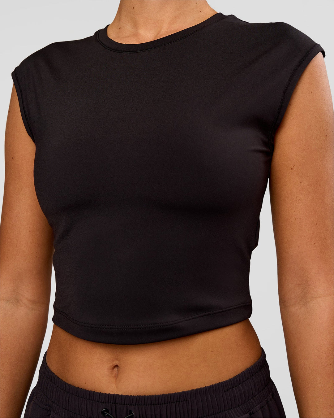 Woman wearing All Day Cropped Sleeve Top - Black | Model:Charli | Size:XS - view 2