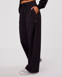 Woman wearing Bend Woven Pant - Black | Model:Charli | Size:XS | Thumbnail Index: 1