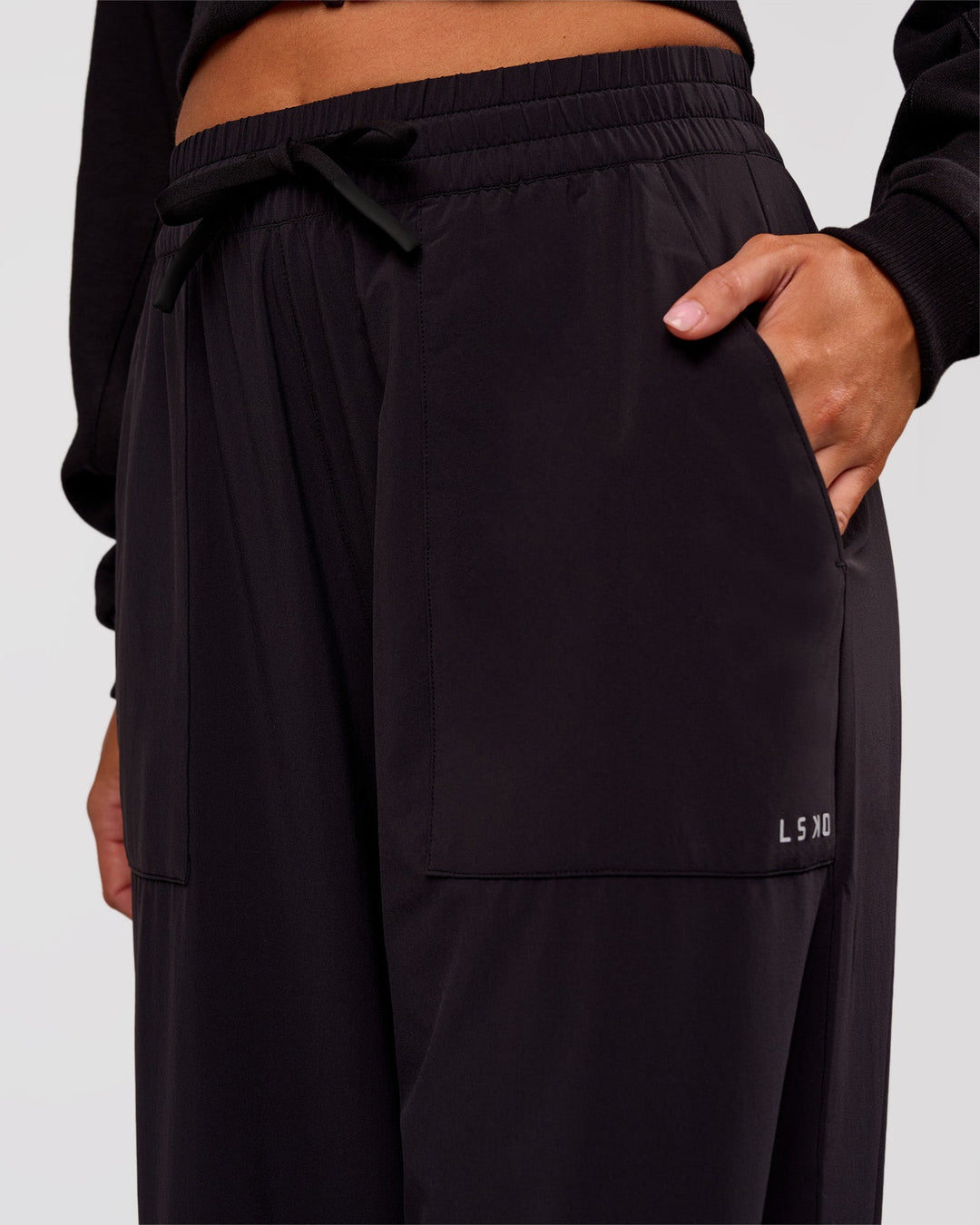 Woman wearing Bend Woven Pant - Black | Model:Charli | Size:XS - view 4