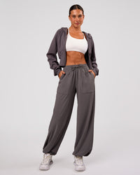 Woman wearing Bend Woven Pant - Duskstone | Model:Charli | Size:XS | Thumbnail Index: 10
